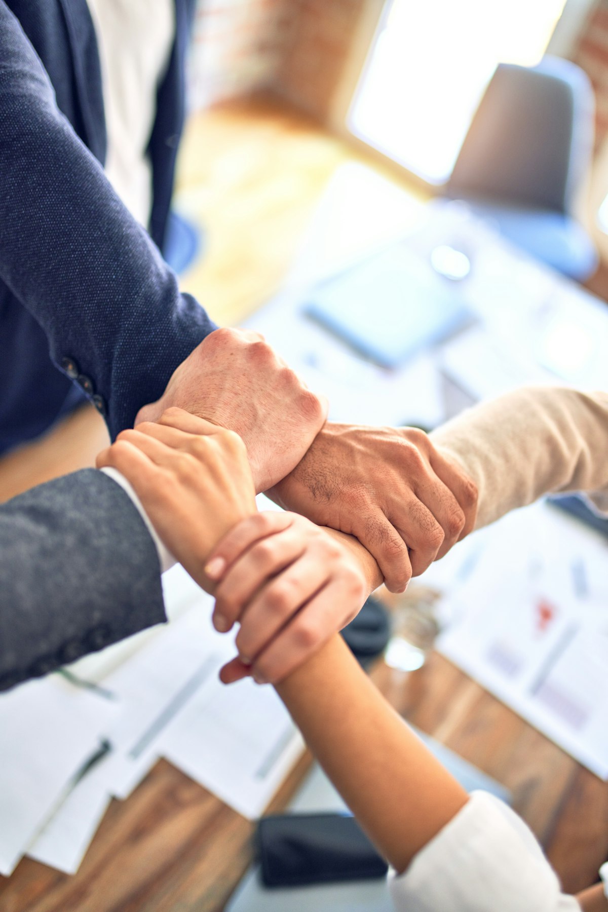 A handshake marking the start of a new partnership